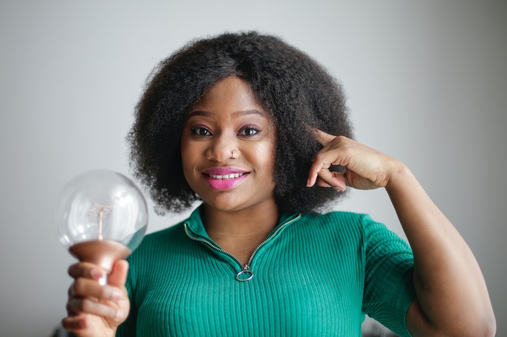 Girl Holding an Idea bulb